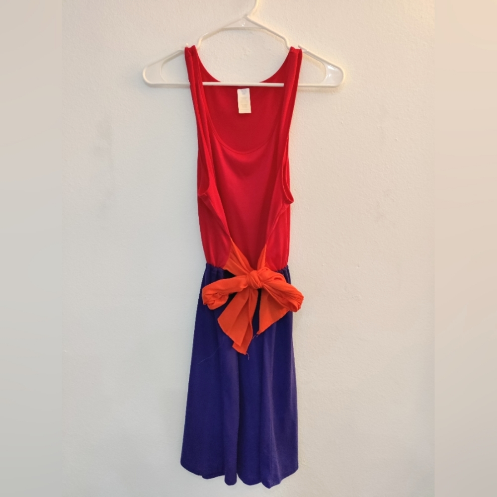 Pink and purple dress with orange belt